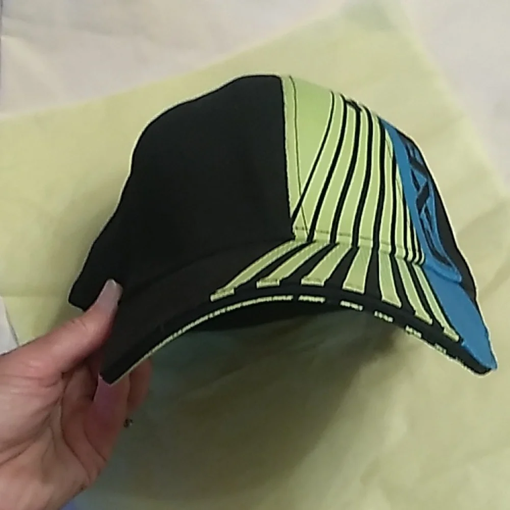 KIDS FXR. Black, bright lime green, teal L/XL baseball hat (not adjustable)